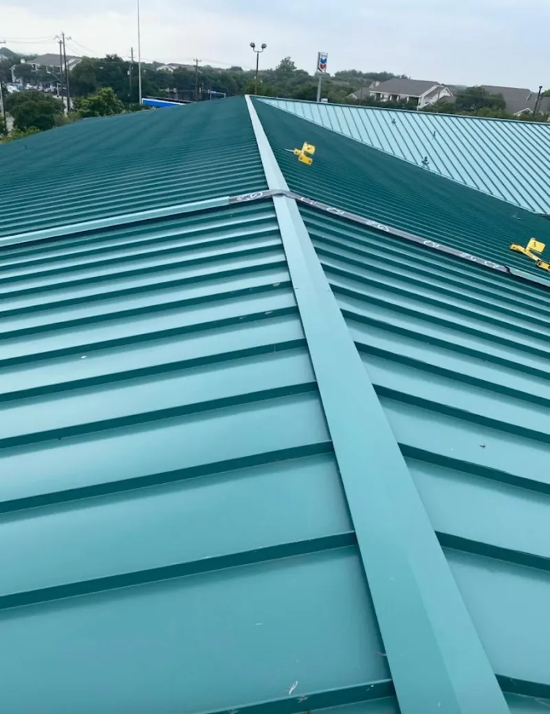 Green commercial metal roof ridge and valley for Metal Roof Repair in Parkland